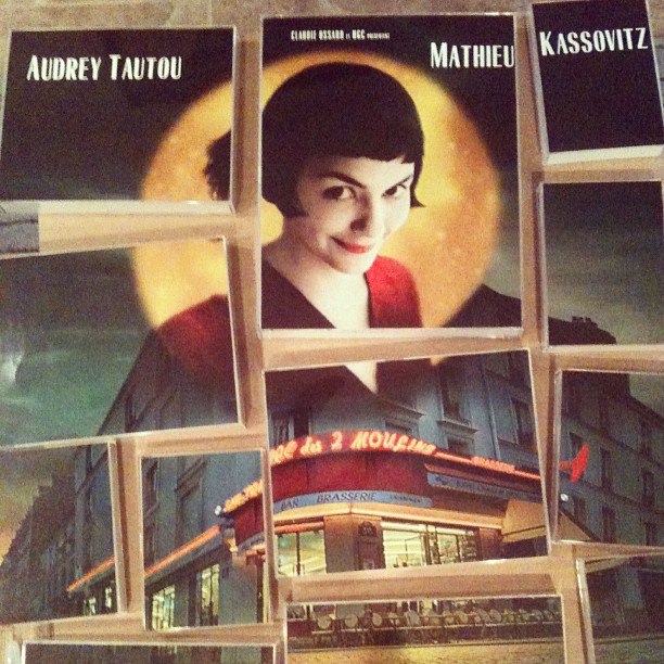 Amelie movie poster cut up and arranged in several smaller frames