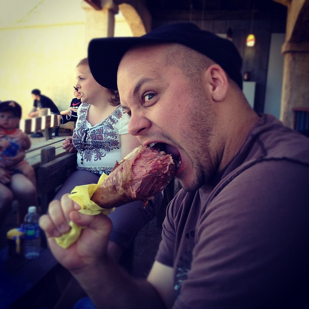 Jake chomping on a giant turkey leg