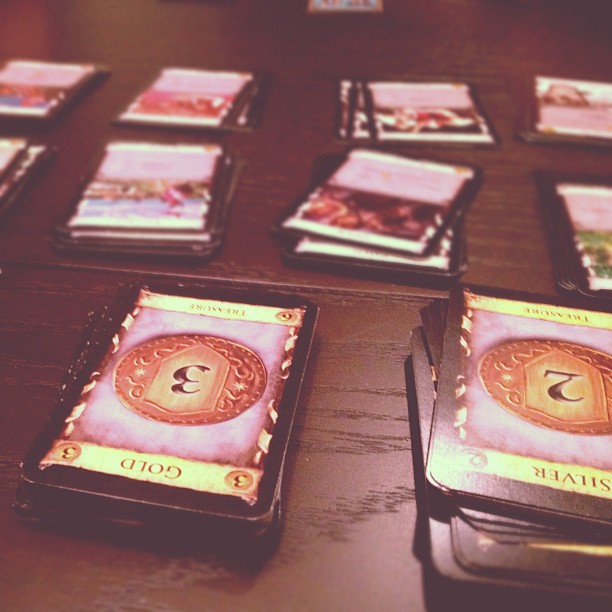 stacks of cards from the tabletop game Dominion