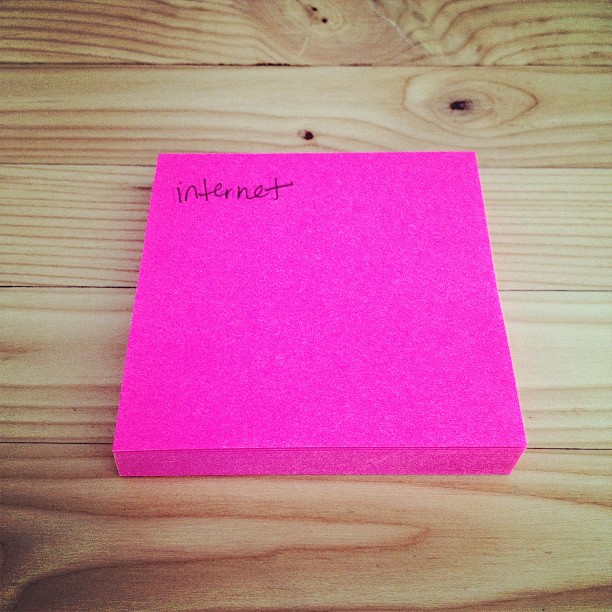 pink post-it note with just the word “internet” written on it