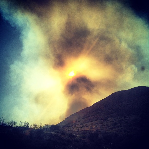 big smoke cloud against the sun