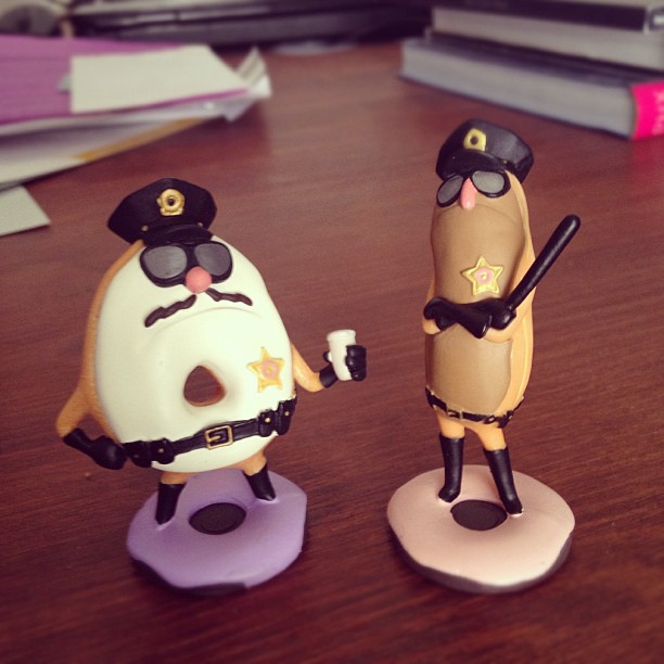 action figures of the donut cops from Wreck-it Ralph