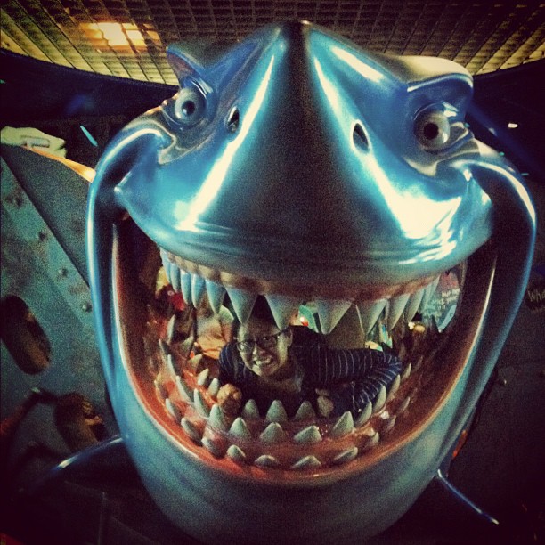 Lynn in the mouth of Bruce the shark from Finding Nemo