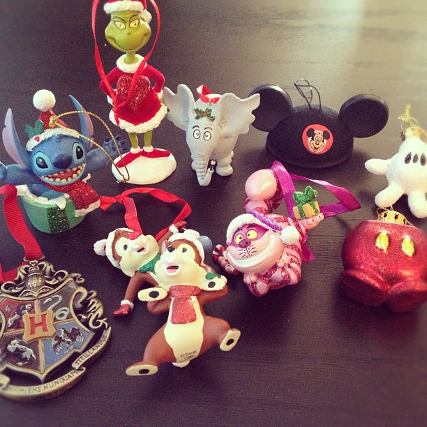 variety of Christmas ornaments including Disney, Harry Potter, and Dr. Seuss characters