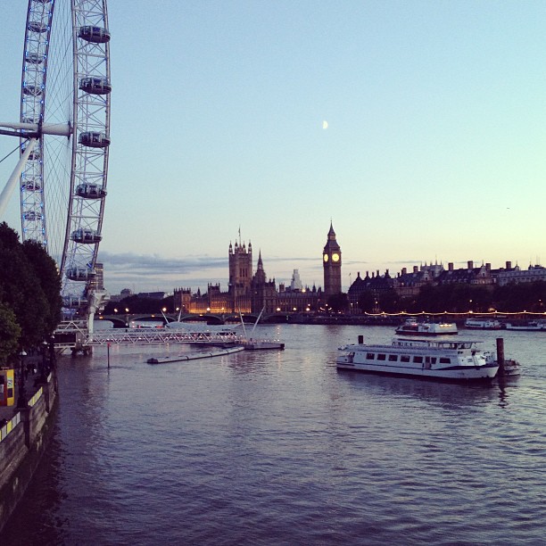 view of Big Ben and the London Eye at dusk