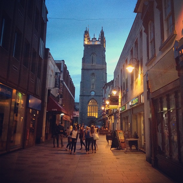 church steeple lit up in the evening