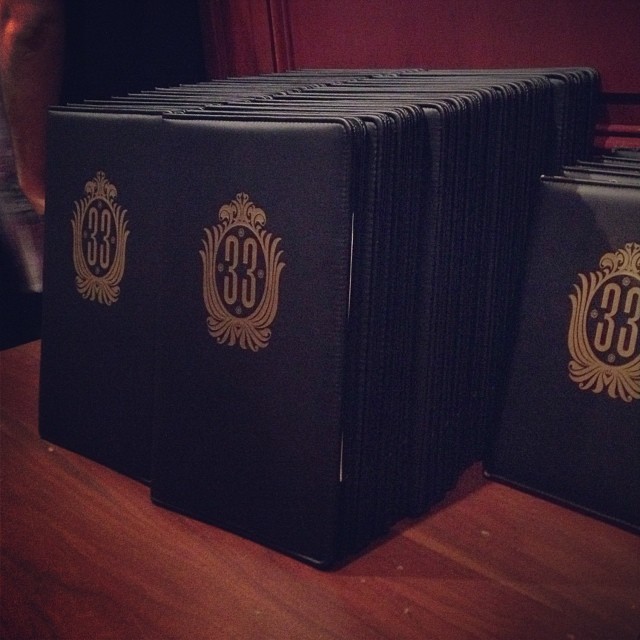 stack of menus for Club 33 at Disneyland