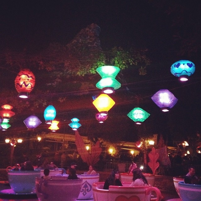 Disneyland teacups lit up at night