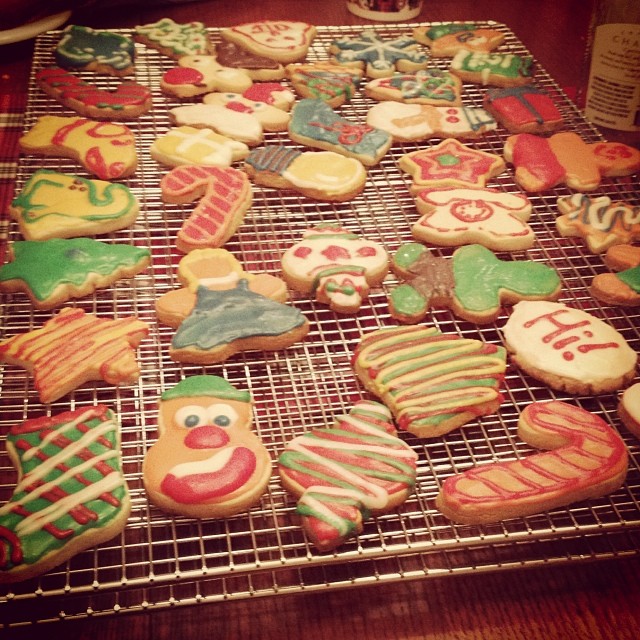 rack of decorated Christmas sugar cookies