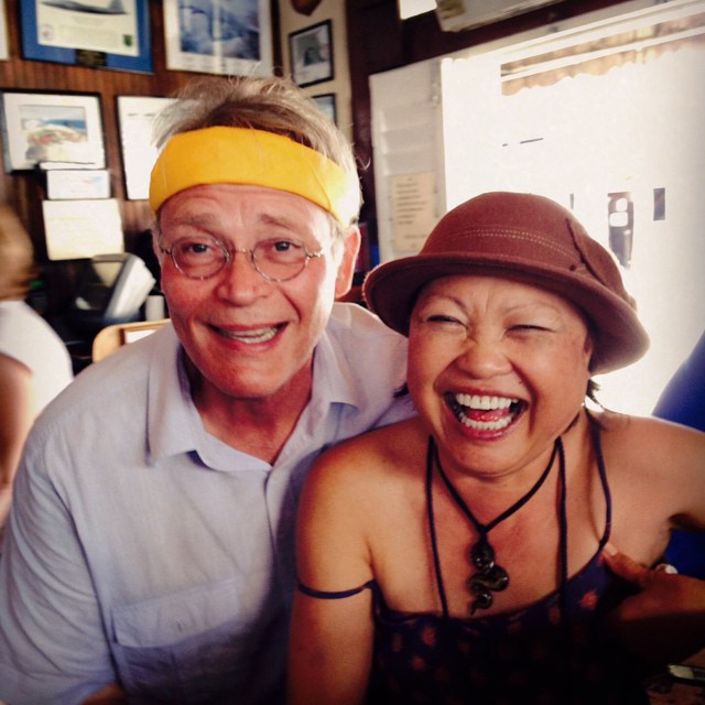 dad and mom smiling big