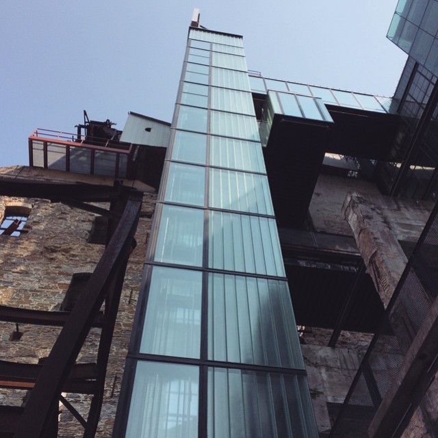 industrial building with tower of glass windows