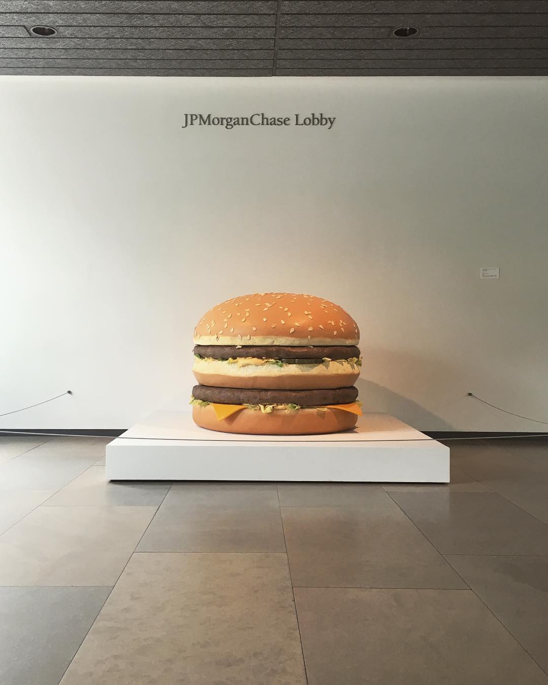 giant cheeseburger on a low platform