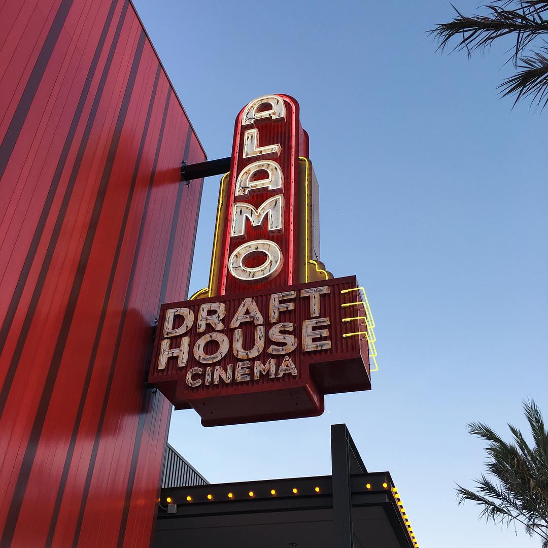 neon sign for Alamo Drafthouse Cinema