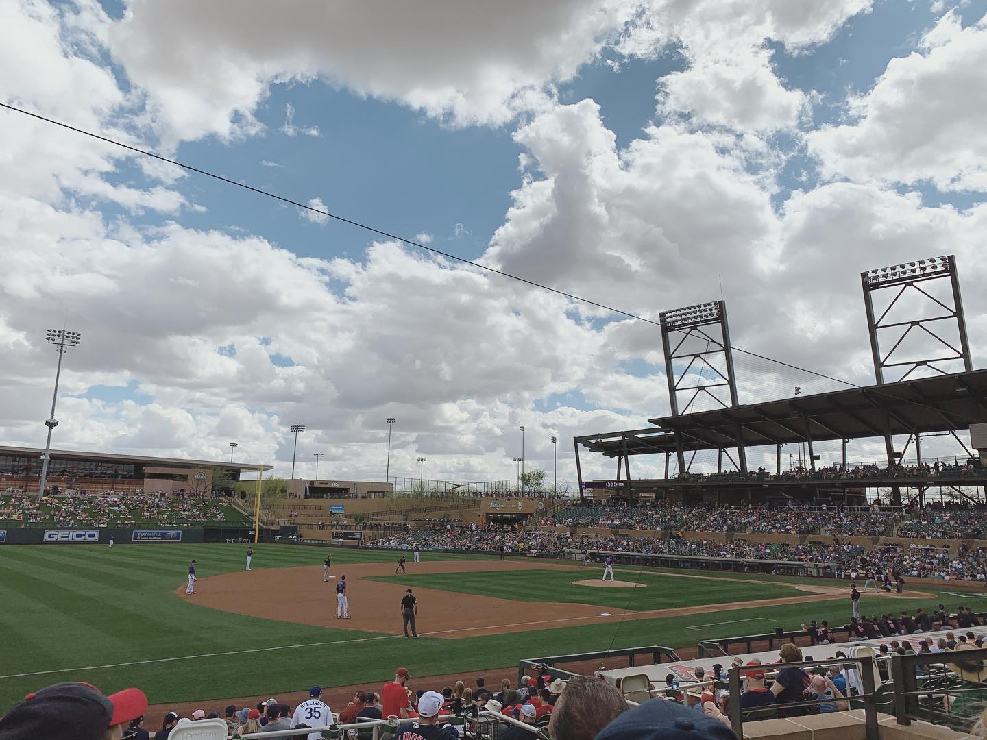 cloudy skies above spring training baseball game